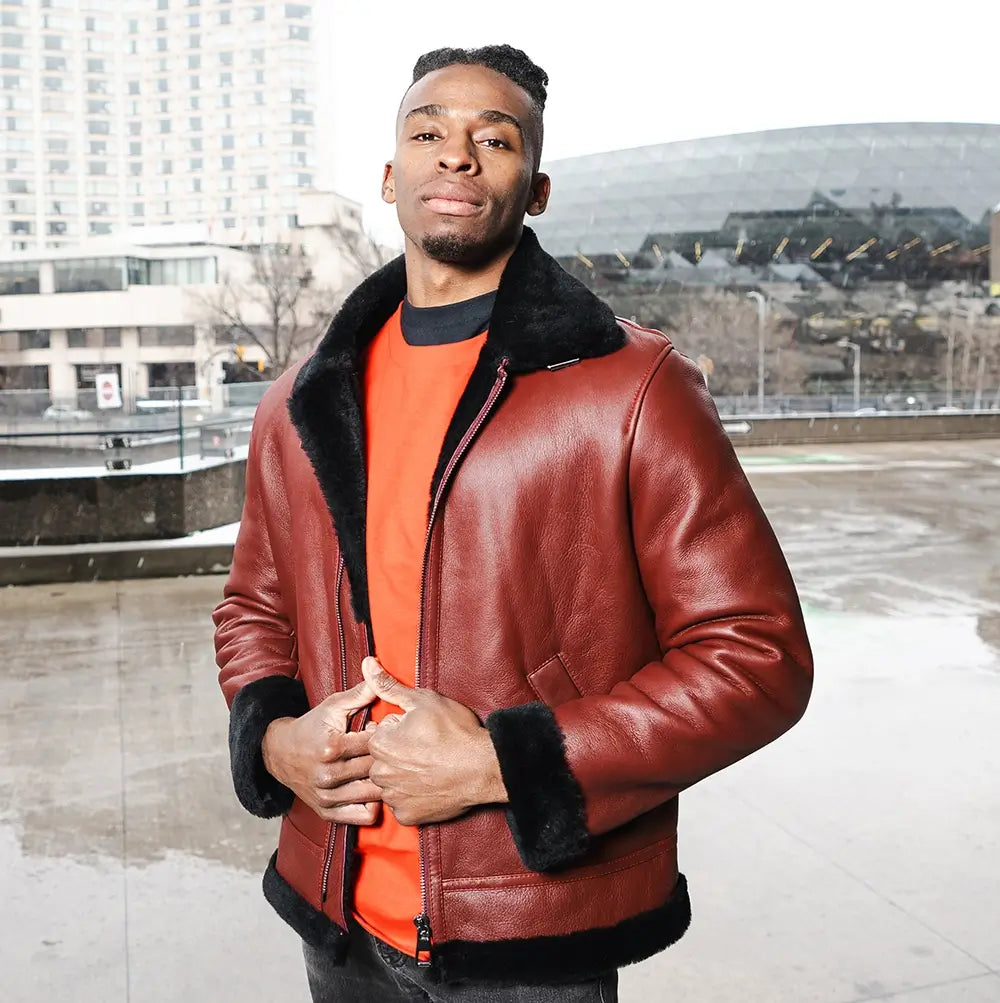 Burgundy leather jacket collection featuring a fur-collared leather jacket for men