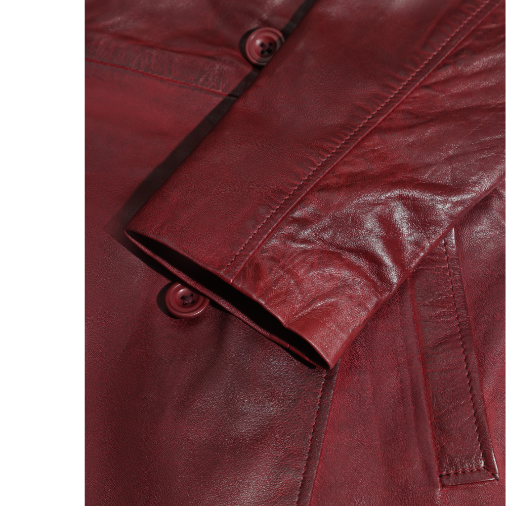 Coral red belted leather coat