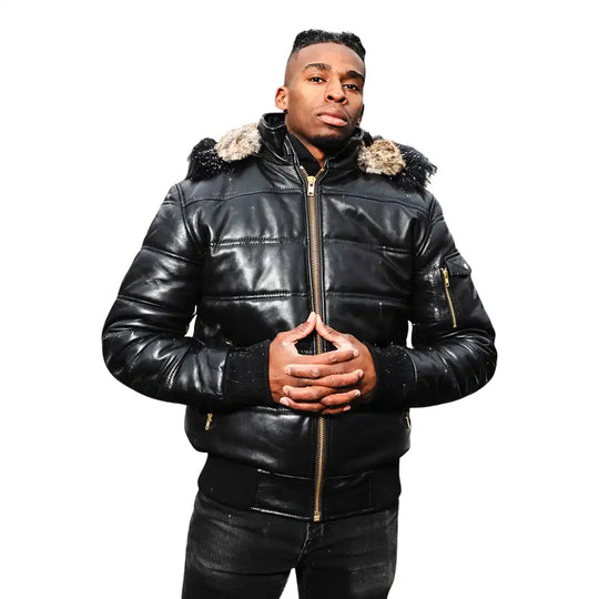 A model wearing the Ash hooded leather puffer jacket with a streetwear outfit, showcasing the urban aesthetic and mid-weight volume.