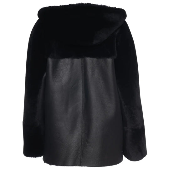 Back view of the Elena reversible shearling jacket featuring a relaxed, boxy fit and visible seam detailing.