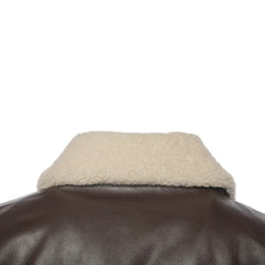 Close-up shot showcasing the rich shearling collar of the Henri Brown A2 Bomber Leather Jacket, emphasizing its premium quality.