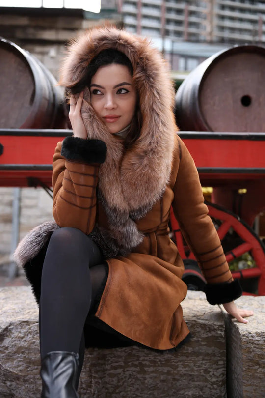 Chantal's Tan Shearling coat with large fox fur hoodie and trim