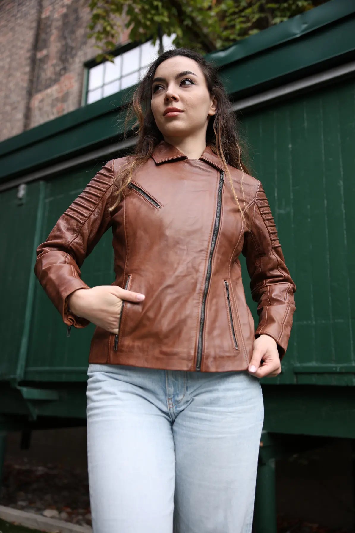 Women's distressed biker leather jacket with piping