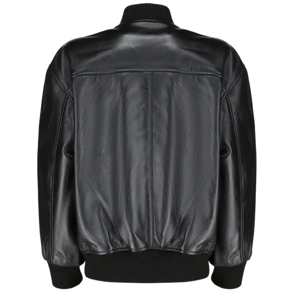 Back view of the Mabel oversized leather bomber showing the gathered elastic waistband and voluminous "balloon" sleeves.