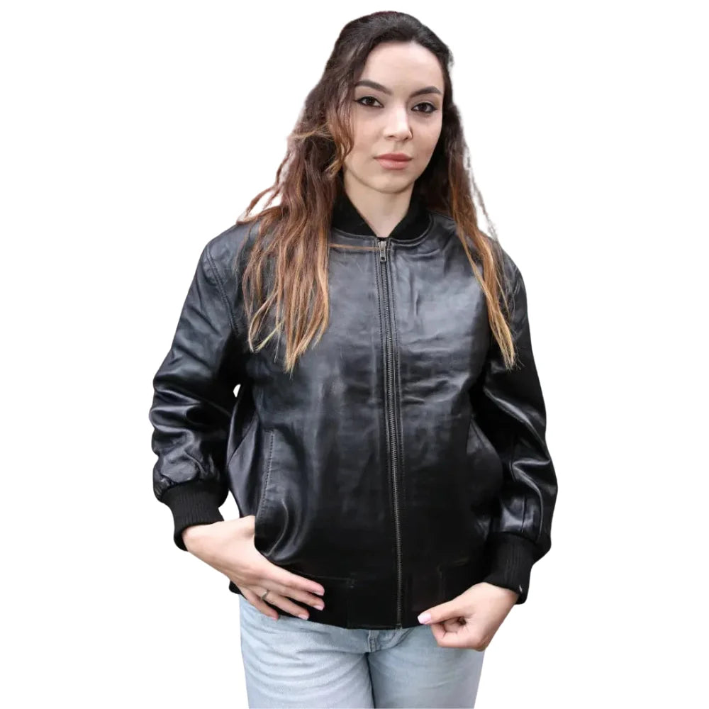 A model wearing the Mabel oversized leather bomber jacket styled casually with denim, showing the relaxed shoulder drop and waist-length crop.