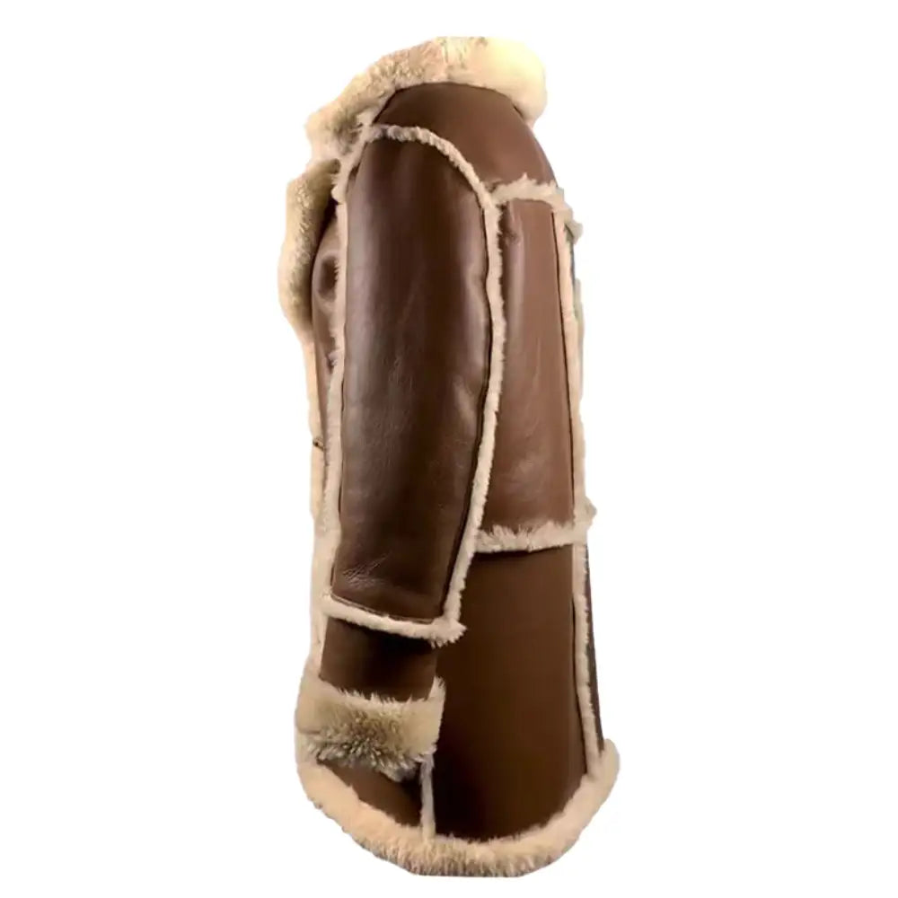side view of Brown shearling overcoat with fur trim on a white background