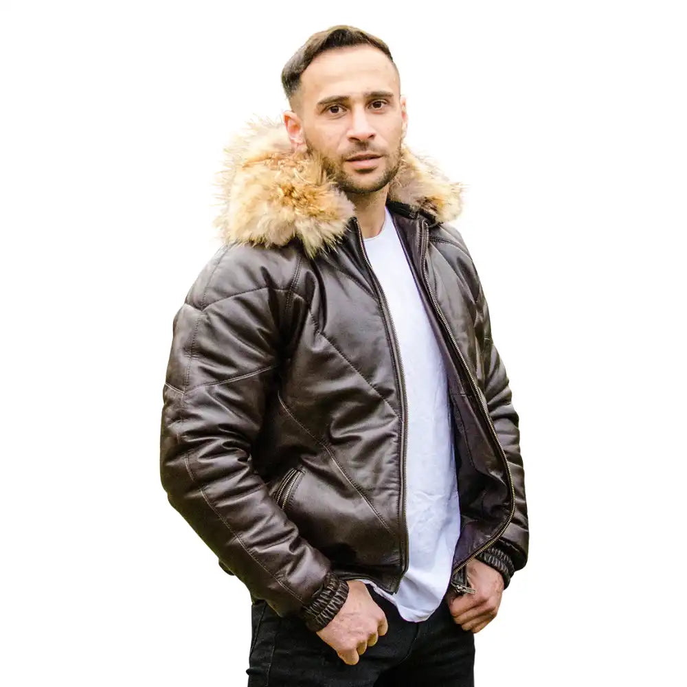 A model wearing the V-Bomber brown leather puffer, demonstrating the jacket’s high-volume fit and premium winter aesthetic.