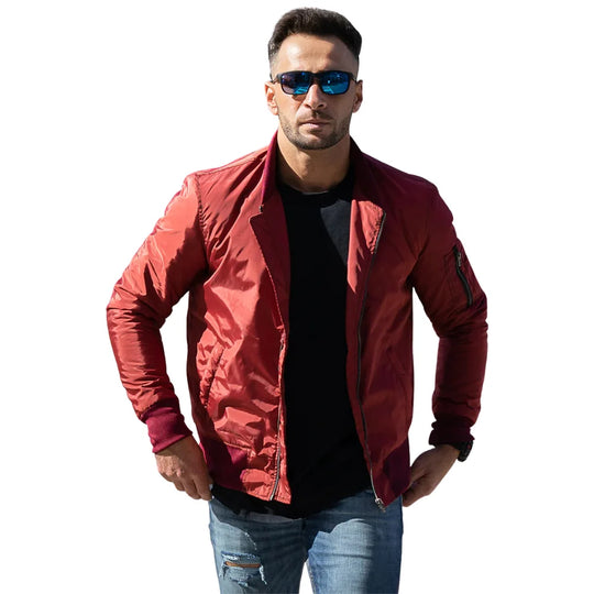 Man wearing Archer's Maroon Nylon Flight Jacket with sunglasses, isolated on a white background.