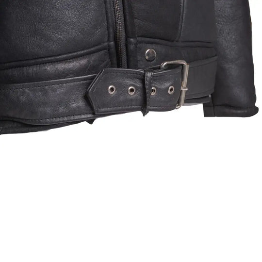 Detailed view of belt buckle on black on black shearling leather biker jacket.
