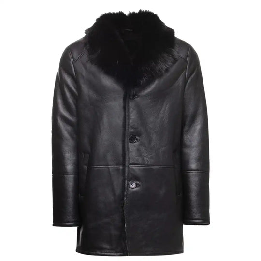 Front view of a black shearling trench coat featuring a dramatic Toscana fur collar and belted waist.