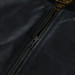 Black Bomber Style Ribbed Jacket close up of front zipper on black leather bomber jacket