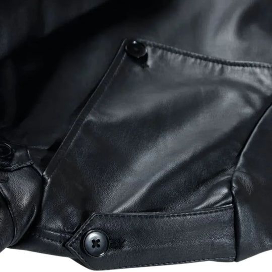 Black Leather Belted and Double Breasted Trench Coat close up waist belt buckle detail
