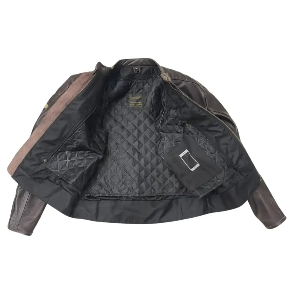 Close-up of the interior classic snap-tab mandarin collar and the aged-brass hardware typical of a brown cafe racer.