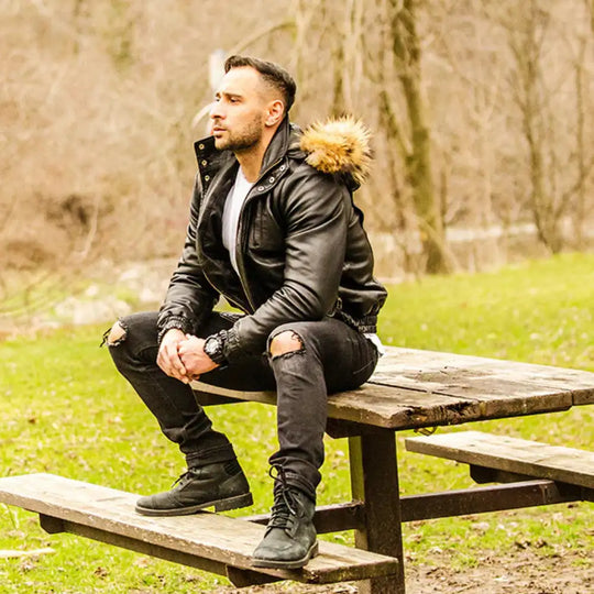 Model side view wearing Castillos Bomber Winter Leather Jacket with Real Fox Fur Hoodie
