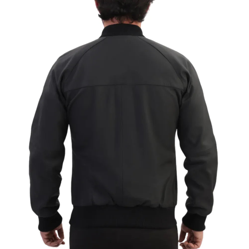 Model wearing Colt Matte Black Ribbed Bomber Jacket back view black leather bomber jacket