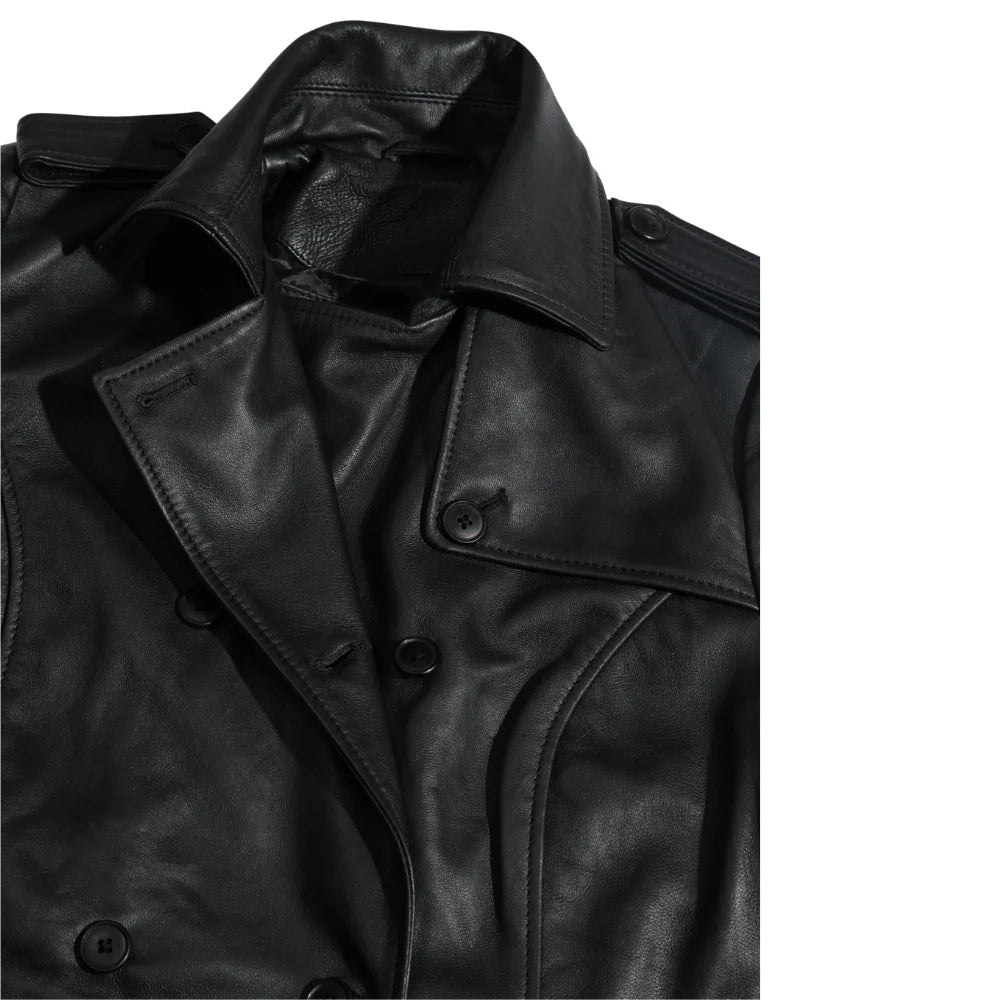 Close-up of a black leather coat lapels with buttons on a white background