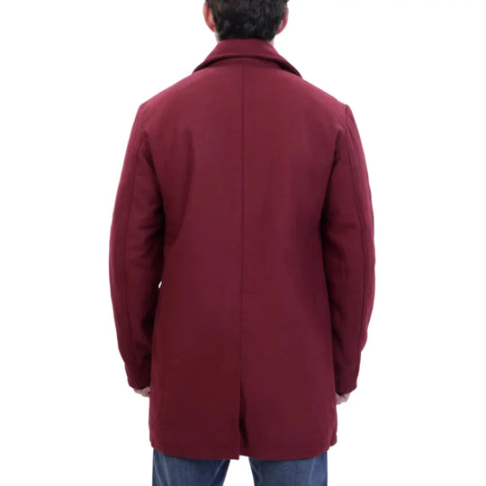 Man wearing a burgundy wool overcoat with a rear view on a white background