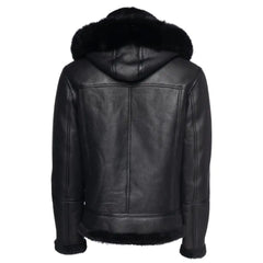 Back view of the black bomber shearling jacket with a cozy fur-lined hood, perfect for colder weather while maintaining a rugged, fashionable look.