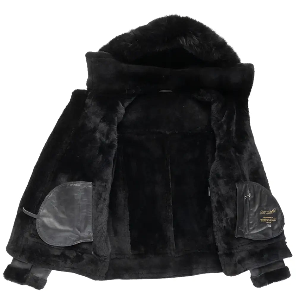Interior of the black bomber shearling jacket showing the full shearling lining for added warmth and comfort, designed with functionality and style.