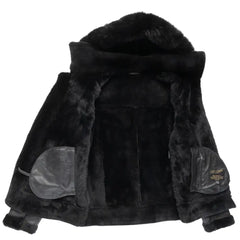 Interior of the black bomber shearling jacket showing the full shearling lining for added warmth and comfort, designed with functionality and style.