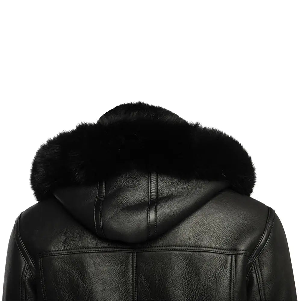 Close-up of the black bomber shearling jacket’s hood detail, highlighting the fur-lined hood and premium leather craftsmanship.