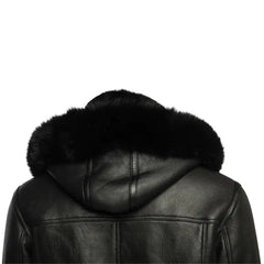 Close-up of the black bomber shearling jacket’s hood detail, highlighting the fur-lined hood and premium leather craftsmanship.