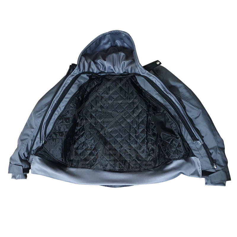 Detailed shot showing the contrast between the rugged grey leather sleeves and the high-density technical textile body.
