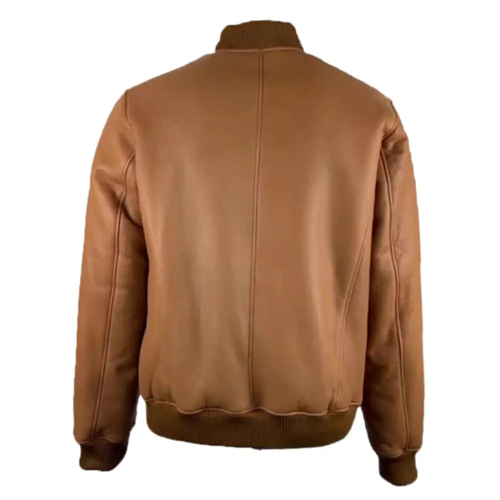 Back view of the Jonathan Tan shearling bomber jacket, showing the clean leather design with a ribbed waistband.