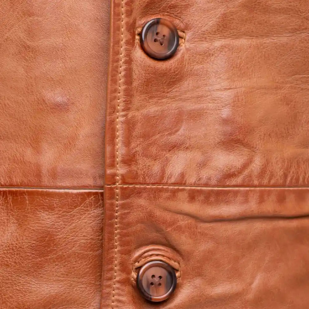 Logan English Tan Leather Trench Coat close up button closure on leather trench coat