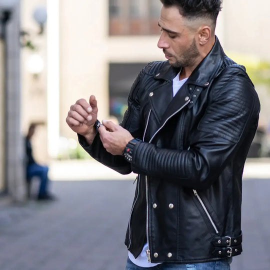 Front model view of Micheals Snap Buttoned Leather Biker Jacket showing biker silhouette