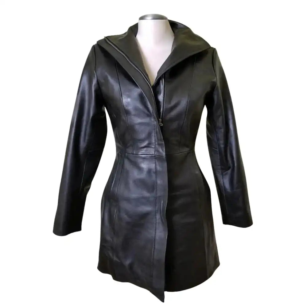 Front view of Nelly's women's long leather coat on a mannequin, featuring double wind flaps and a button-down closure.