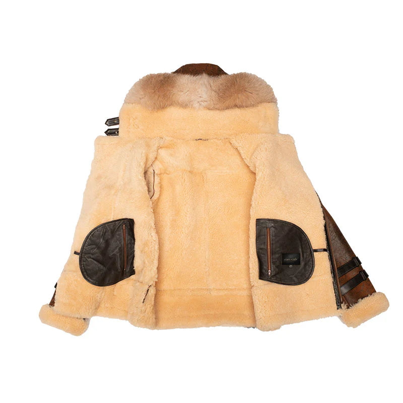 Close-up shot of the thick, warm cream sheepskin shearling interior and inner pockets of the Rocco vintage brown jacket.