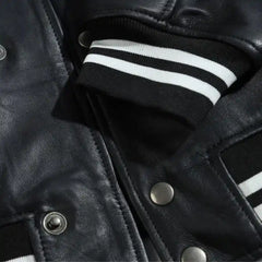 Ryder Black Varsity Style Leather Jacket close up sleeve leather texture
