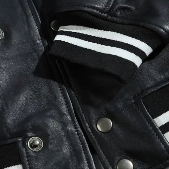 Ryder Black Varsity Style Leather Jacket close up sleeve leather texture