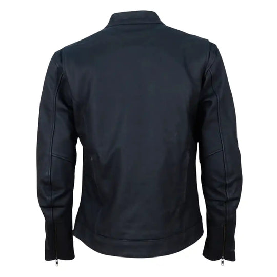 Back view of the matte black leather trucker jacket showing a clean, seamless back panel and adjustable button tabs at the waist for a tapered fit.