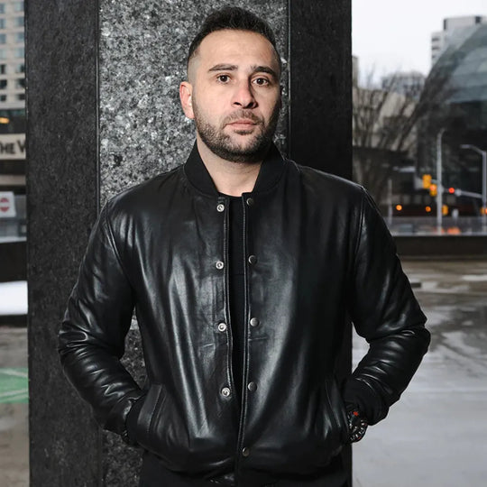 Model wearing Victor Black Varsity Leather Jacket casual varsity outfit
