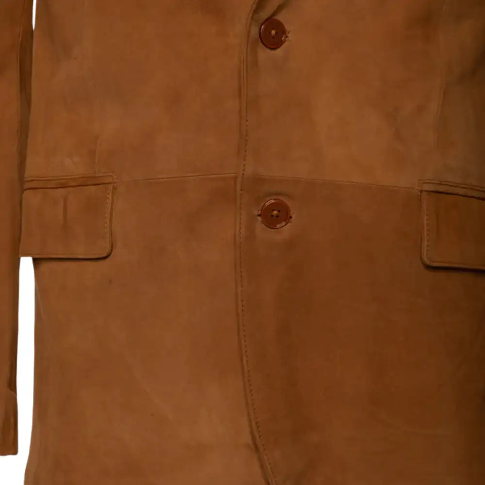 Close-up of a Wyatt tan suede leather blazer with button details on a white background